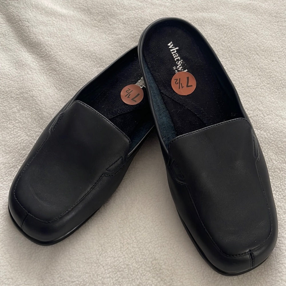 What’s what Brand New Leathers Black slip slippers size 8.5